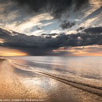 Buy canvas prints of Storm Clouds Reflect on Brancaster Beach by David Powley