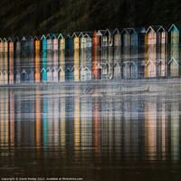 Buy canvas prints of Stunning Cromer Beach Hut Seascape by David Powley