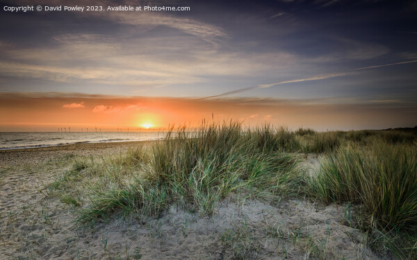 Peaceful Sunrise on Caister Beach Framed Mounted Print by David Powley