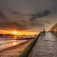 Buy canvas prints of Cromer Seafront Sunrise by David Powley