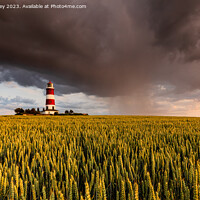 Buy canvas prints of Evening Rain Shower Over Happisburgh Lighthouse by David Powley