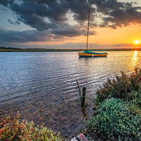 Buy canvas prints of Golden Evening at Blakeney Harbour by David Powley