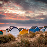 Buy canvas prints of Southwold beach huts at sunrise Suffolk by David Powley
