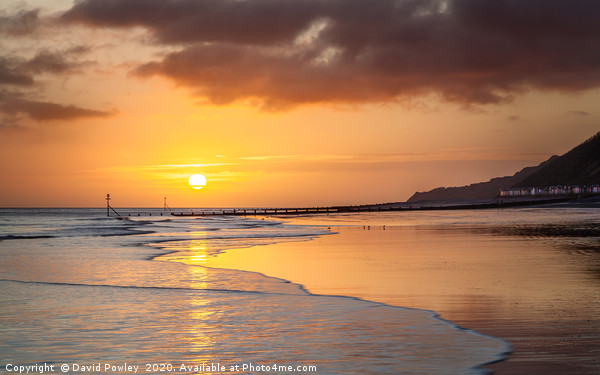 Sunrise over Cromer beach Framed Mounted Print by David Powley
