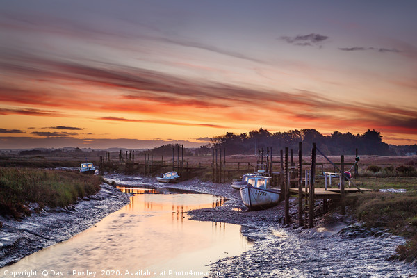 Low tide sunrise at Thornham Picture Board by David Powley