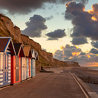 Buy canvas prints of Cromer beach huts at sunset by David Powley