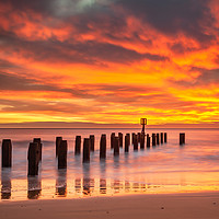Buy canvas prints of Sunrise over Lowestoft beach Suffolk by David Powley