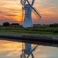 Buy canvas prints of Sunset Reflections at Thurne Mill by David Powley