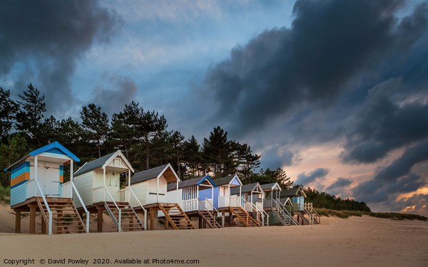 Wells-next-the-sea Beach Huts at Sunset Framed Mounted Print by David Powley