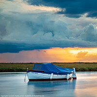 Buy canvas prints of Blakeney boat at sunset by David Powley