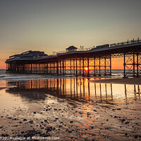 Buy canvas prints of Cromer Pier Sunrise Norfolk by David Powley