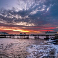 Buy canvas prints of Cromer Pier Sunrise Norfolk by David Powley