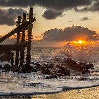 Buy canvas prints of Sunrise on Happisburgh Beach by David Powley