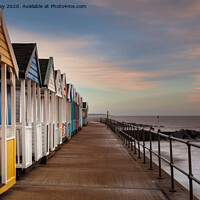 Buy canvas prints of Southwold Beach Huts at Dawn by David Powley