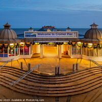 Buy canvas prints of Cromer Pier Entrance at Dawn by David Powley