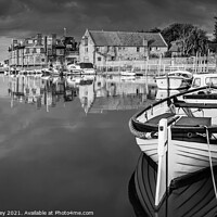 Buy canvas prints of Reflections at Blakeney Harbour Norfolk Monochrome by David Powley