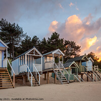 Buy canvas prints of Evening Light on the Beach Huts at Wells Norfolk by David Powley