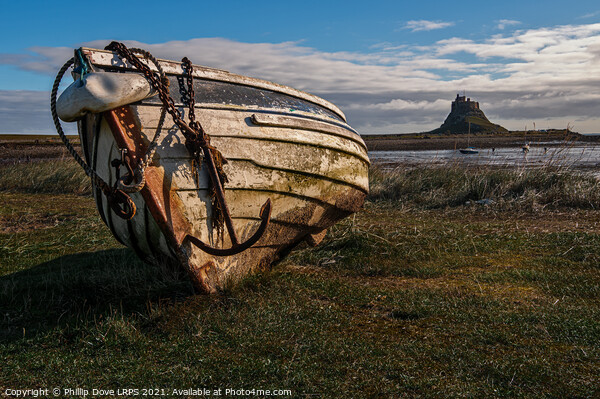 Fishing Coble on the shore at Holy Island Picture Board by Phillip Dove LRPS