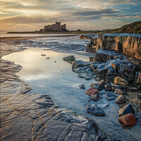 Buy canvas prints of Bamburgh Castle by morning light by Phillip Dove LRPS