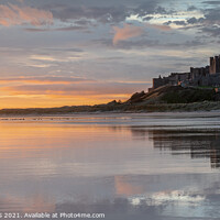 Buy canvas prints of Bamburgh Castle Dawn Reflections by Phillip Dove LRPS