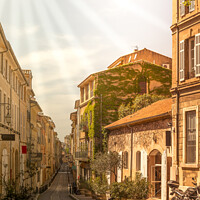 Buy canvas prints of Quiet street in Provence France - no people in a small street with ivy covered wall  by Michelle Silke