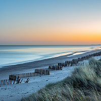 Buy canvas prints of Sunrise at Holme beach by Eddie Deane