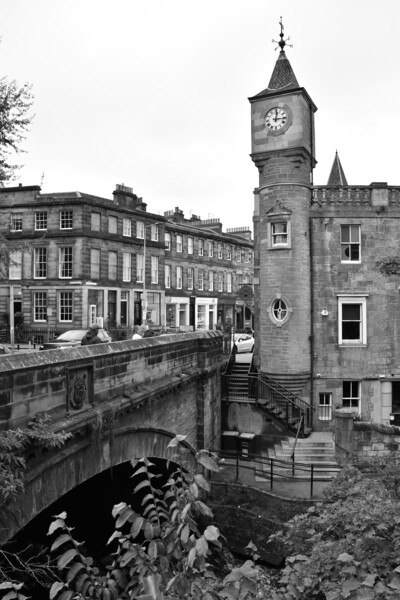 Clocktower and bridge at Stockbridge Picture Board by Theo Spanellis