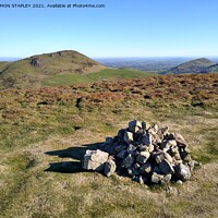 Buy canvas prints of Caer Caradoc and The Lawley in spring sunshine by SIMON STAPLEY