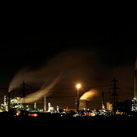 Buy canvas prints of OIL REFINERY AND SMOKE ILLUMINATIONS by SIMON STAPLEY