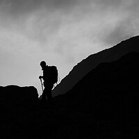 Buy canvas prints of Silhouette of mountain guide  by Christopher Stores