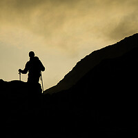 Buy canvas prints of Mountain Guide approaches the summit by Christopher Stores