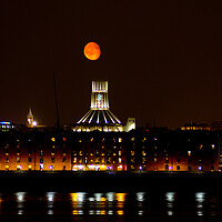Buy canvas prints of Liverpool Catholic Cathedral with Moon in the background by Christopher Stores