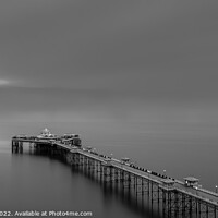 Buy canvas prints of Serene Sunrise Over Iconic Welsh Pier by Clive Ingram