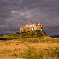 Buy canvas prints of Storm clouds over Lindisfarne Castle by Clive Ingram