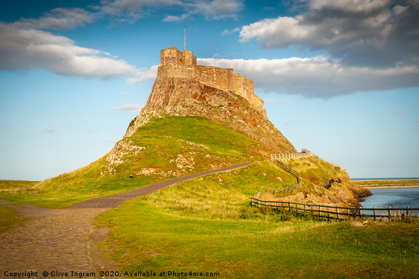 Majestic Lindisfarne Castle on Holy Island Picture Board by Clive Ingram