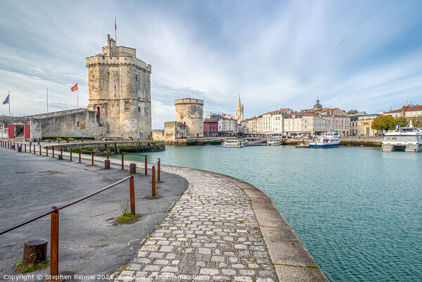 Two medieval towers at the entrance to La Rochelle Picture Board by Stephen Rennie