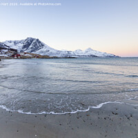 Buy canvas prints of Snowy mountains from a beach in Norway by Amanda Hart