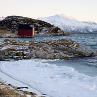 Buy canvas prints of Red hut by the sea, winter in Norway by Amanda Hart
