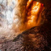 Buy canvas prints of Standing behind A large waterfall in a cave by simon cowan