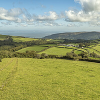 Buy canvas prints of Looking over Lucott Farm to the Exmoor Coast by Shaun Davey