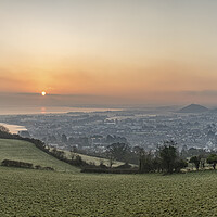 Buy canvas prints of Colourful winter sunrise over Minehead by Shaun Davey