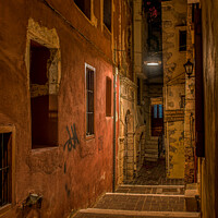 Buy canvas prints of The creepy Moschon alley in the middle of the night lit by a str by Stig Alenäs
