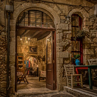 Buy canvas prints of Entrance to a boutique at the romanticue stairs on the Zampeliou by Stig Alenäs
