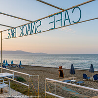 Buy canvas prints of Cafe and snack bar with no guests overlooking the azure Mediterr by Stig Alenäs