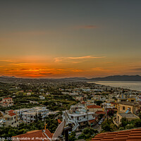 Buy canvas prints of sunset over Platanias bay from a high viewpoint by Stig Alenäs