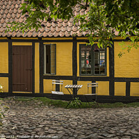 Buy canvas prints of the courtyard behind H C andersen´s  childhood home in Odense by Stig Alenäs