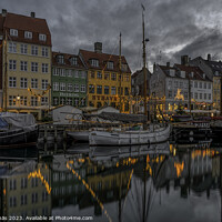 Buy canvas prints of Christmas deocorations reflect in Copenhagen Nyhavn canal  by Stig Alenäs