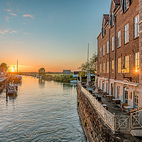 Buy canvas prints of Ribe river and the restaurant Kolvig in the sunset by Stig Alenäs