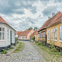 Buy canvas prints of Picturesque street in an anciet alleyway in  Ebelt by Stig Alenäs