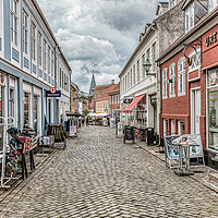 Buy canvas prints of Shopping street  with many different stores in Ebe by Stig Alenäs
